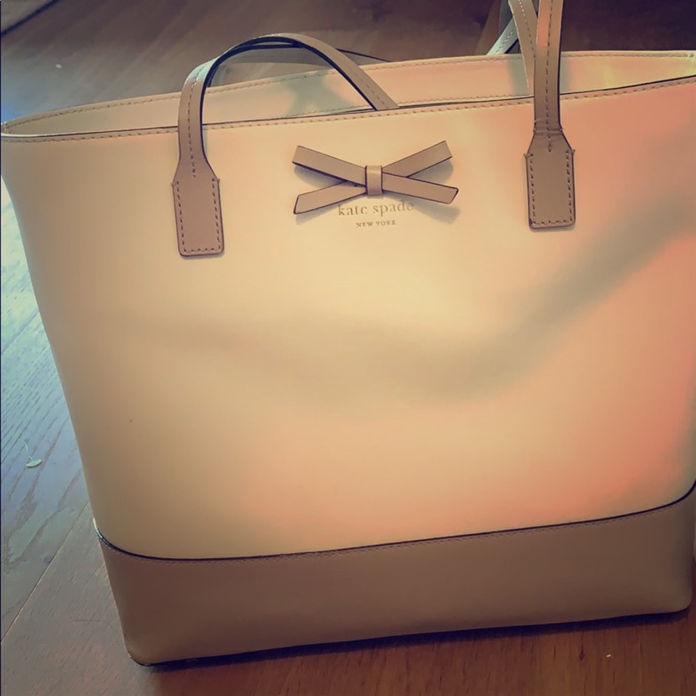 Kate spade - 17 inches across and 11 inches down.